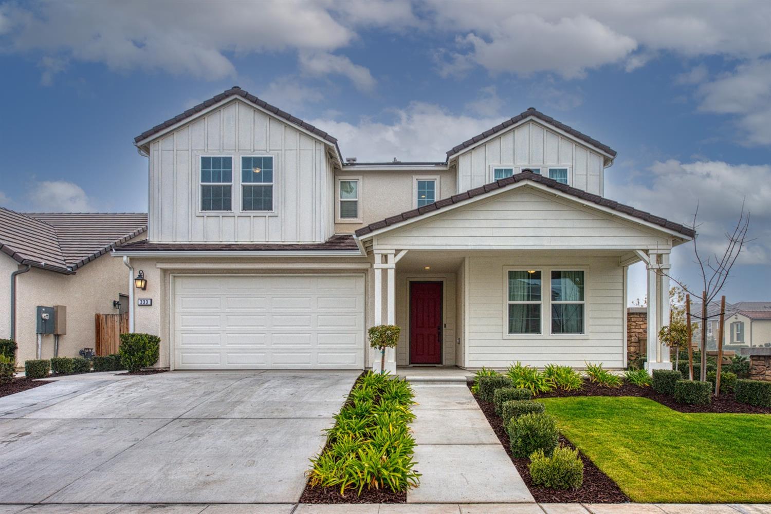 333 Meridian Avenue Madera, CA 93636 - Photo 1 of 38 a front view of a house with a yard