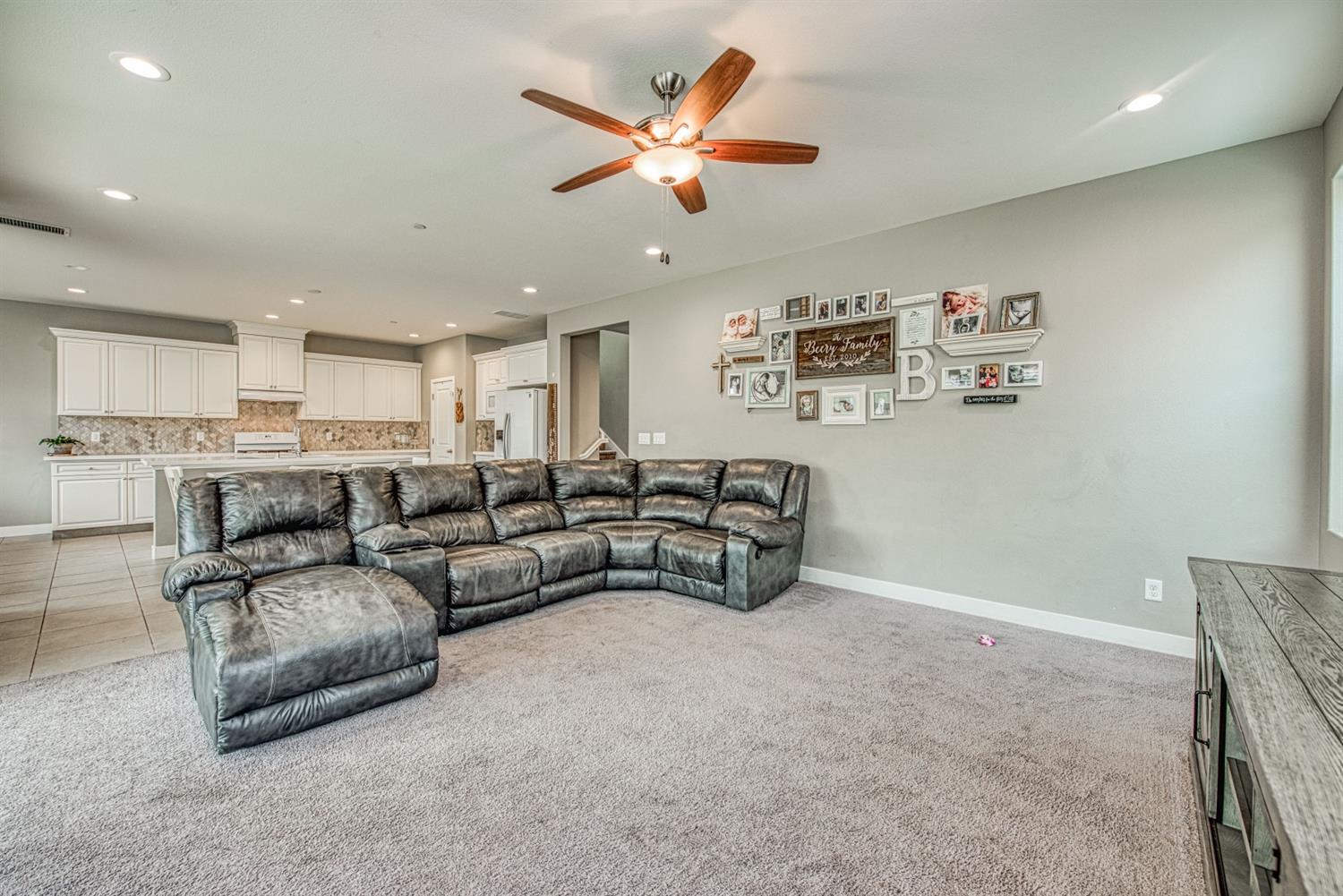 333 Meridian Avenue Madera, CA 93636 - Photo 13 of 38 a living room with furniture and kitchen view