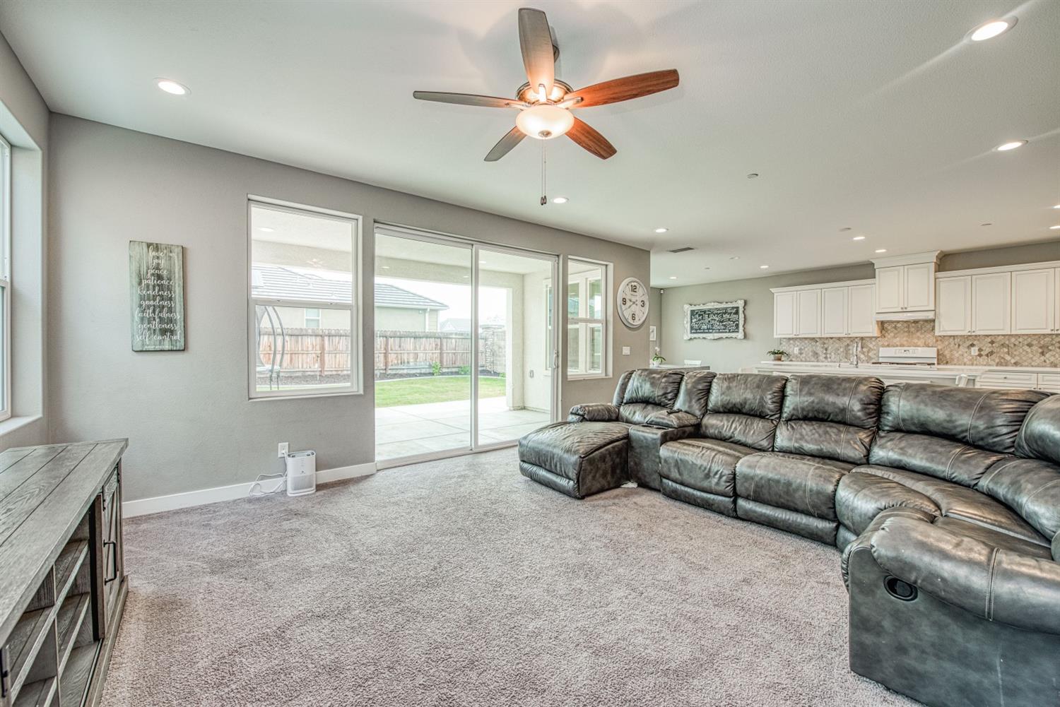 333 Meridian Avenue Madera, CA 93636 - Photo 14 of 38 a living room with furniture and a large window