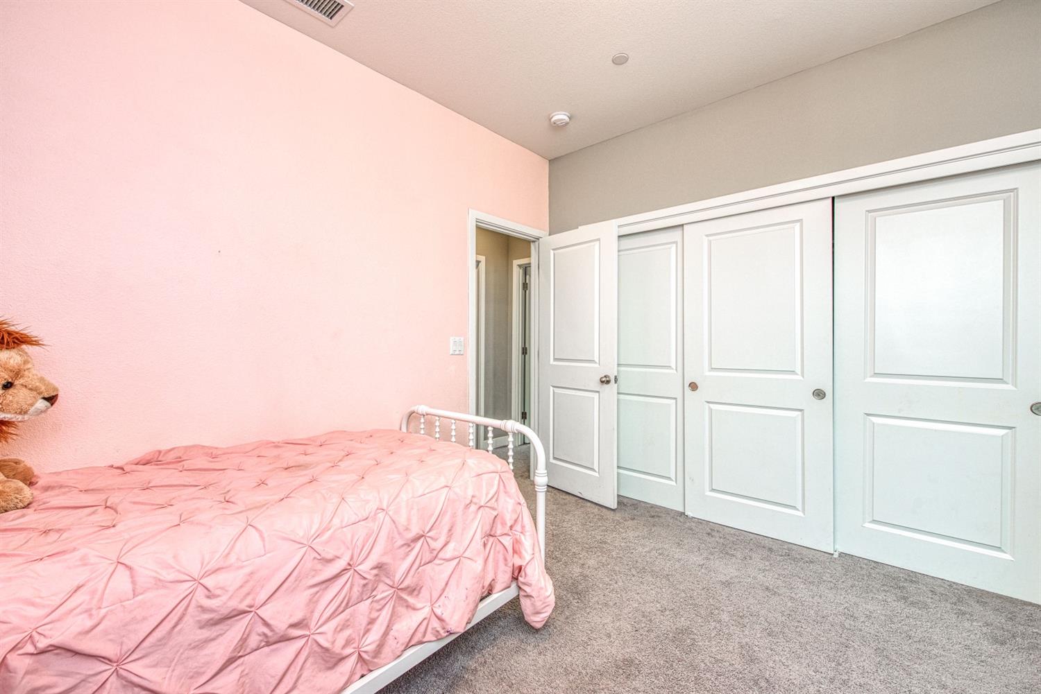 333 Meridian Avenue Madera, CA 93636 - Photo 25 of 38 a bedroom with a bed and closet