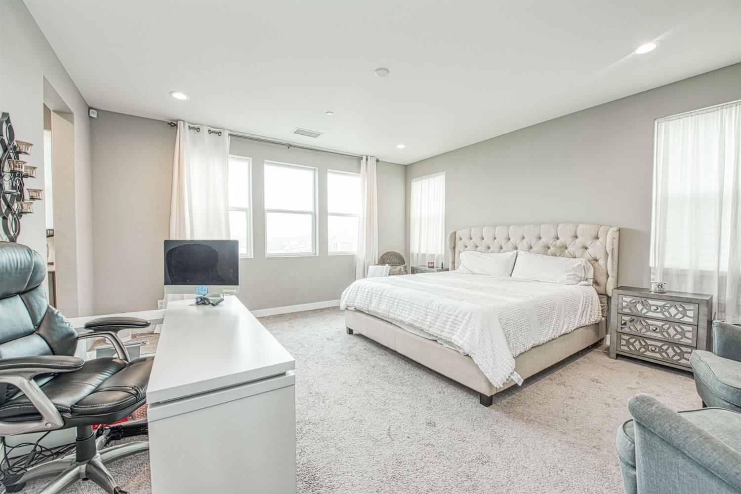 333 Meridian Avenue Madera, CA 93636 - Photo 29 of 38 a bedroom with a bed and furniture