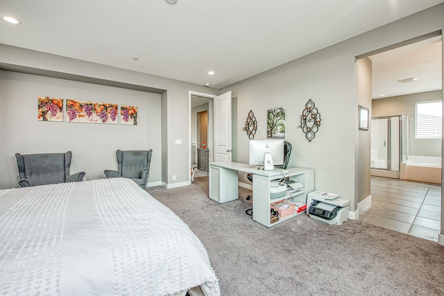 333 Meridian Avenue Madera, CA 93636 - Photo 30 of 38 a bedroom with bed and a large mirror