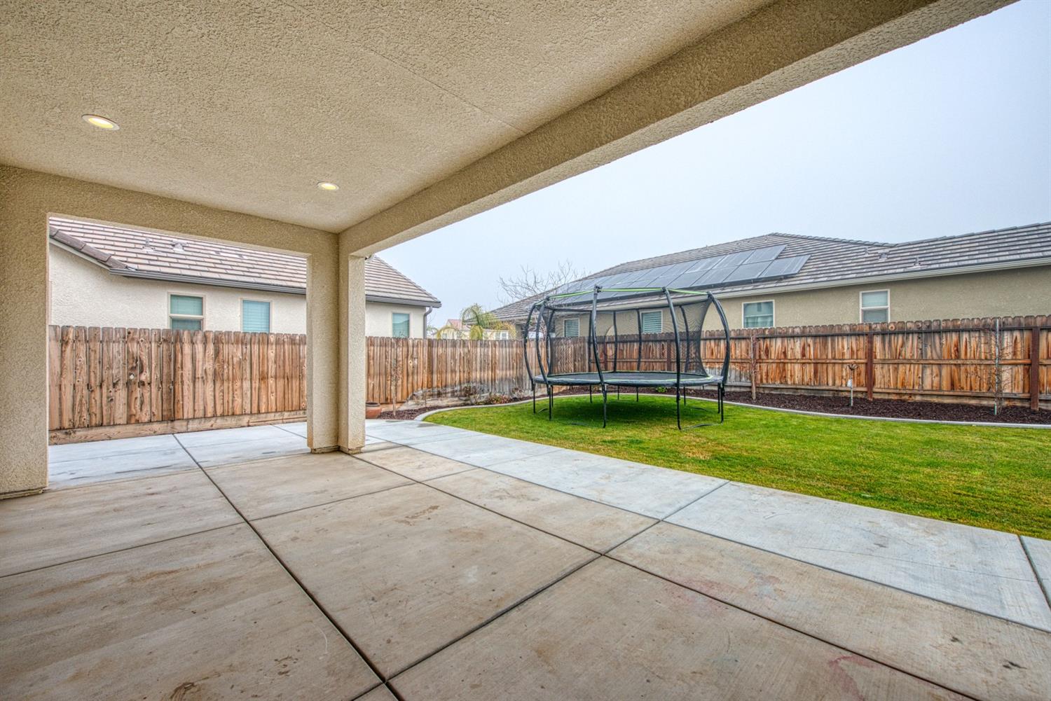 333 Meridian Avenue Madera, CA 93636 - Photo 33 of 38 a view of an house with a backyard