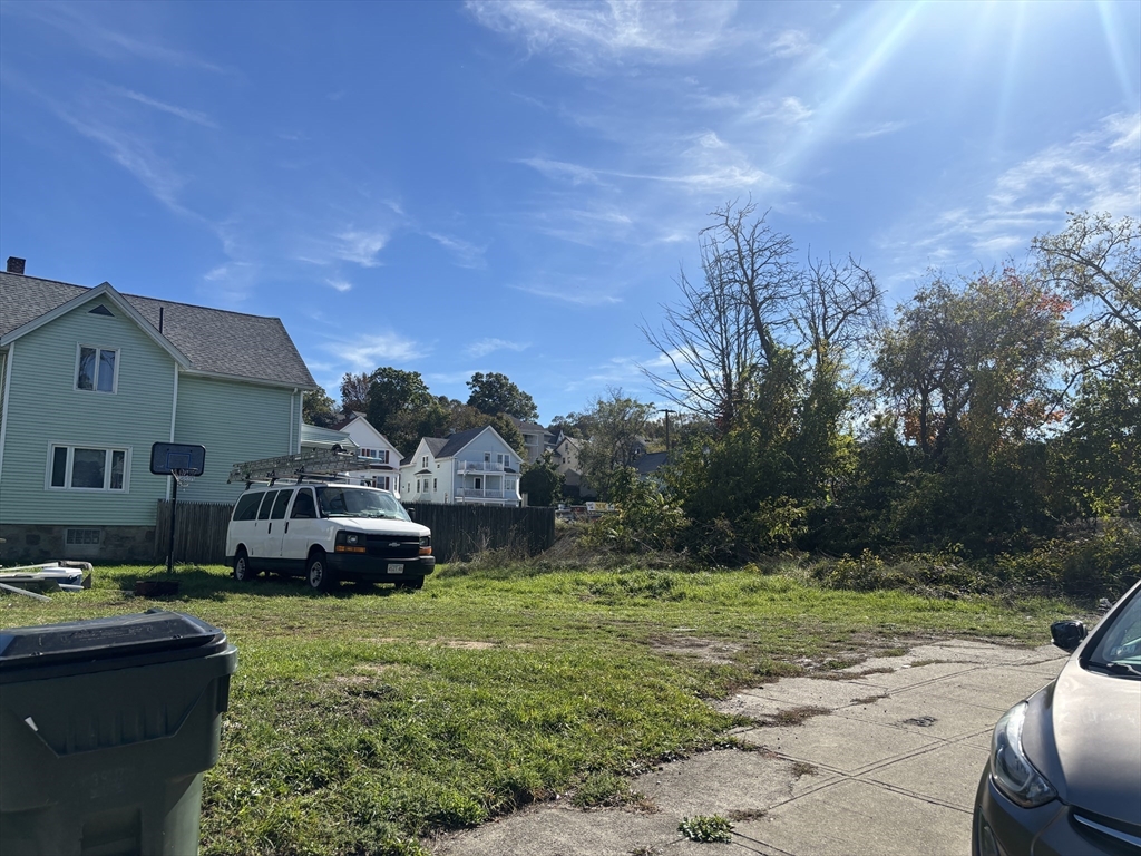 11 Dyer Street Fall River, MA 02720 - Photo 3 of 3 a house view with a garden space