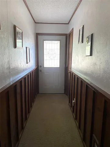 a hallway with windows