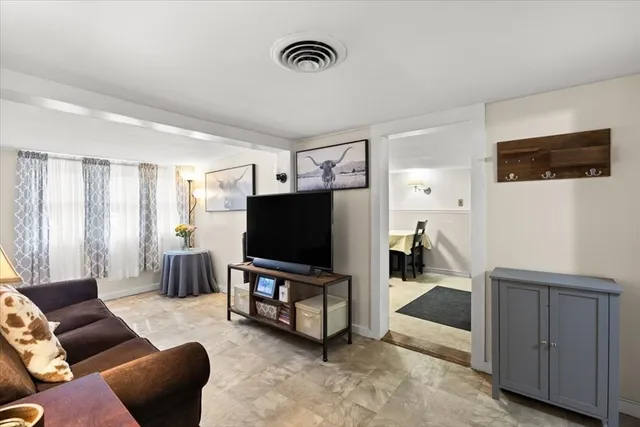 a view of a bedroom with washer and dryer