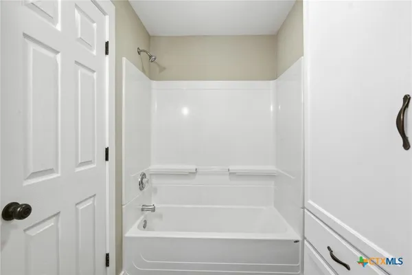 a bathroom with a bathtub