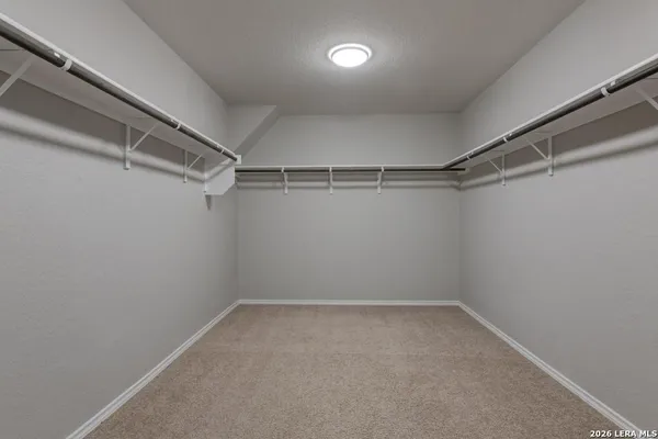 a view of a room with racks on the wall