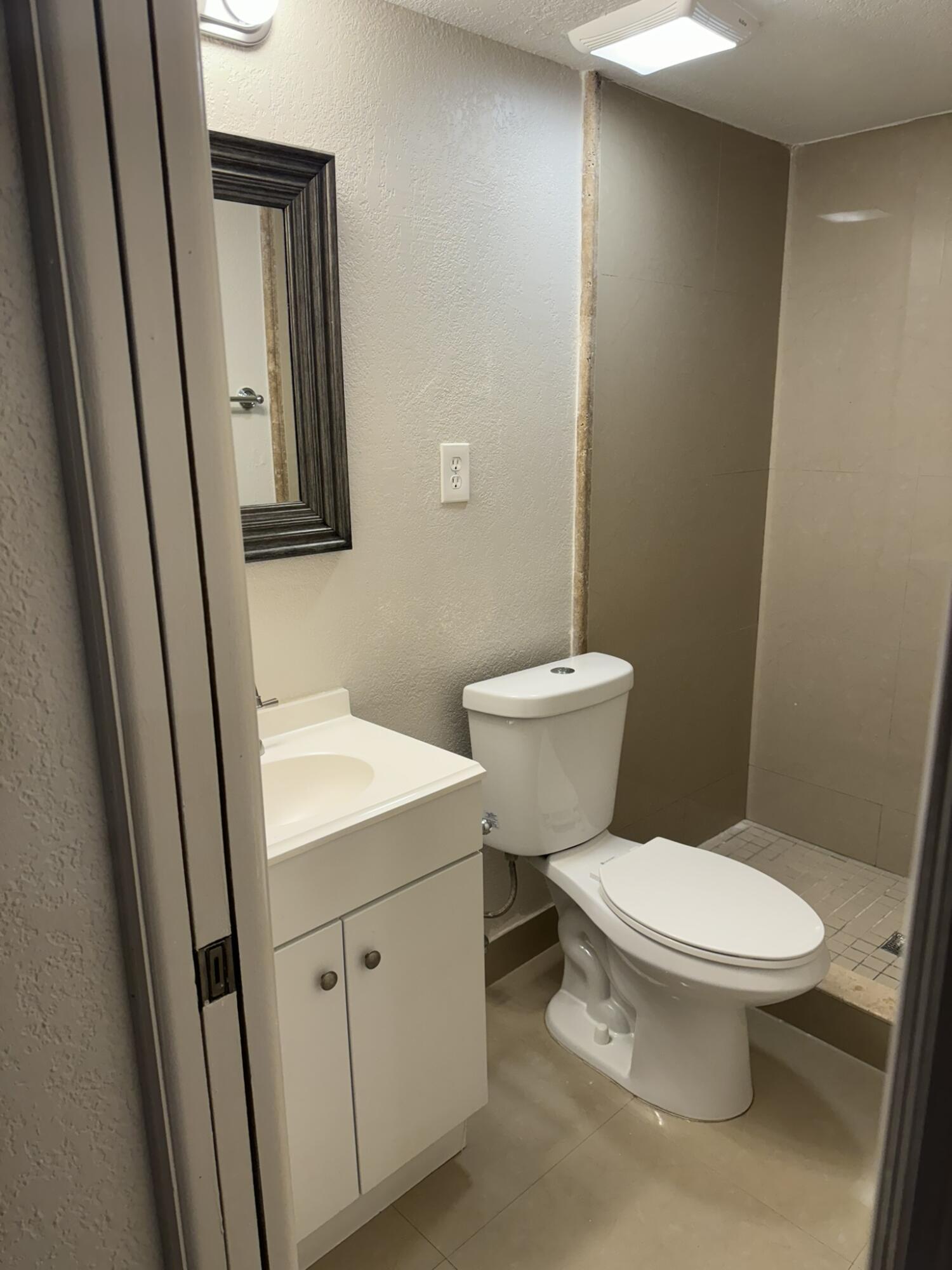 9033 Northwest 174th Street, Unit STUDIO Hialeah, FL 33018 - Photo 6 of 8 Upgraded Bathroom
