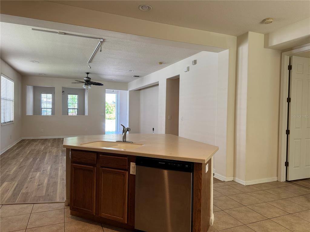 8237 Dunham Station Drive Tampa, FL 33647 - Photo 13 of 33 a kitchen with a sink a counter space and appliances
