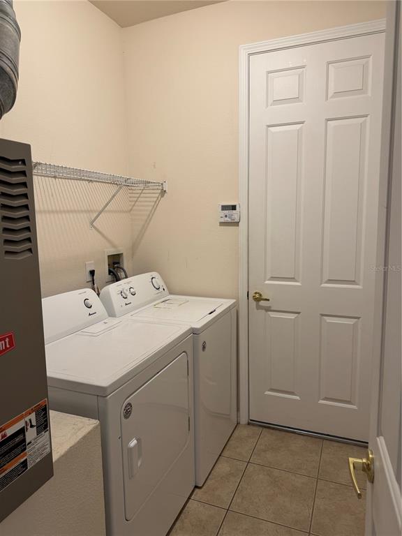8237 Dunham Station Drive Tampa, FL 33647 - Photo 24 of 33 a utility room with a sink
