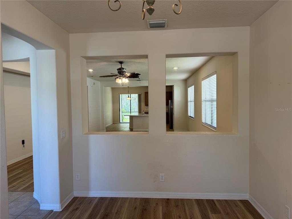 8237 Dunham Station Drive Tampa, FL 33647 - Photo 7 of 33 a view of an entryway with wooden floor
