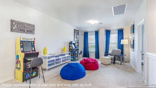 a room with furniture and a large window