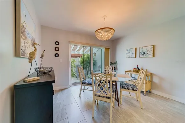a view of a livingroom with furniture and window