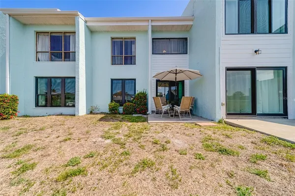 an aerial view of a city with a lake view