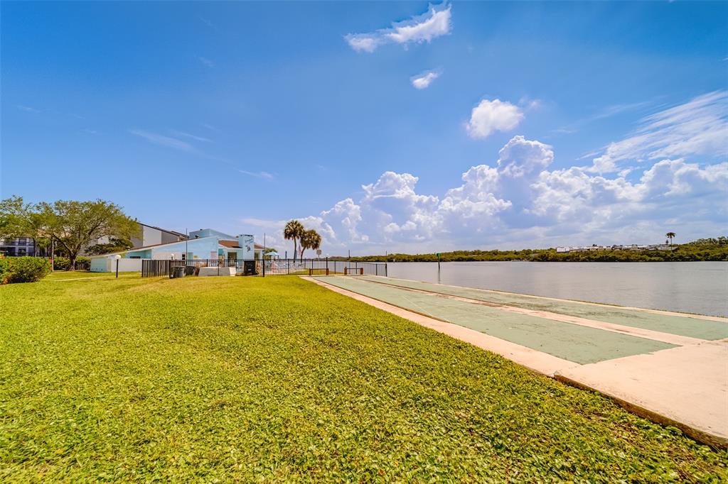 1 Windrush Boulevard, Unit 63 Indian Rocks Beach, FL 33785 - Photo 43 of 60 a view of an ocean and beach