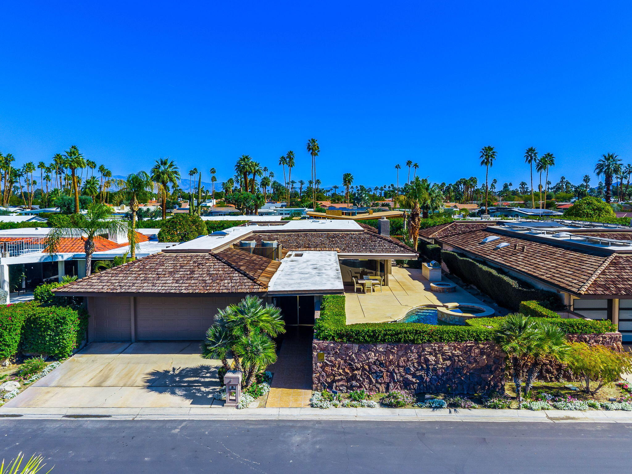 146 Yale Drive Rancho Mirage, CA 92270 - Photo 55 of 63 an aerial view of a house with a garden