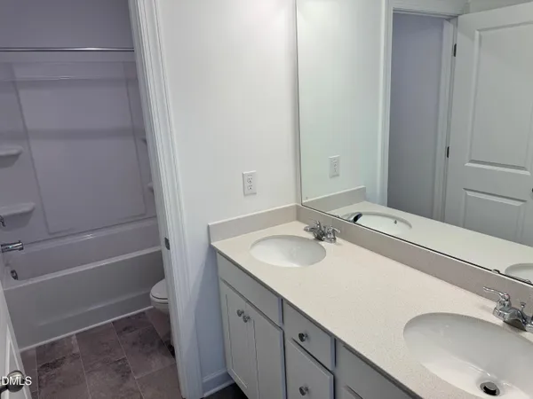 a bathroom with a sink and a tub