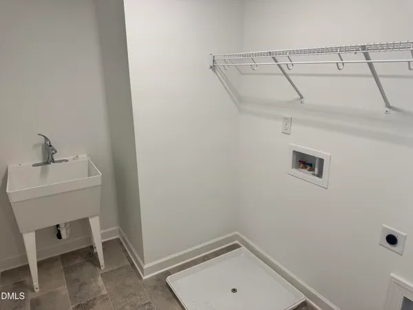a bathroom with a sink and shower