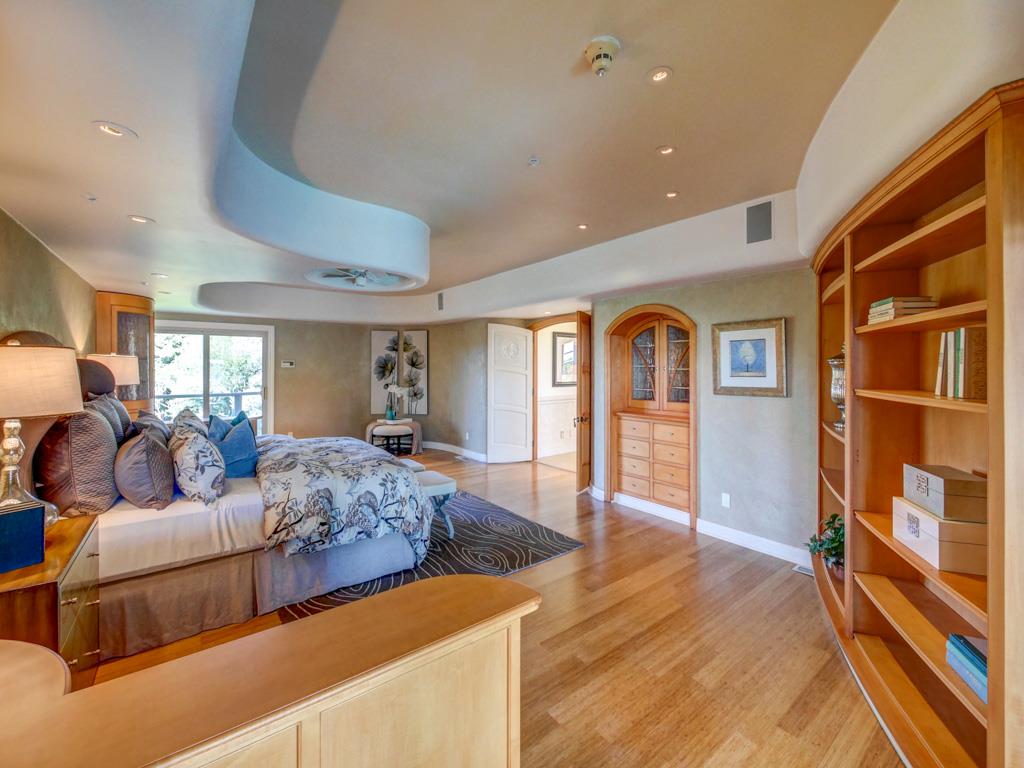 631 Quail Run Road Aptos, CA 95003 - Photo 16 of 39 a living room with furniture and a fireplace