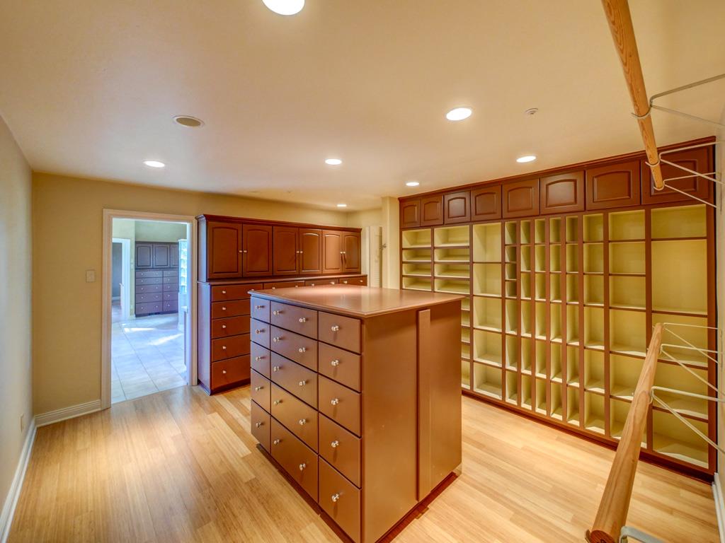 631 Quail Run Road Aptos, CA 95003 - Photo 19 of 39 a kitchen with stainless steel appliances kitchen island granite countertop a refrigerator and a stove