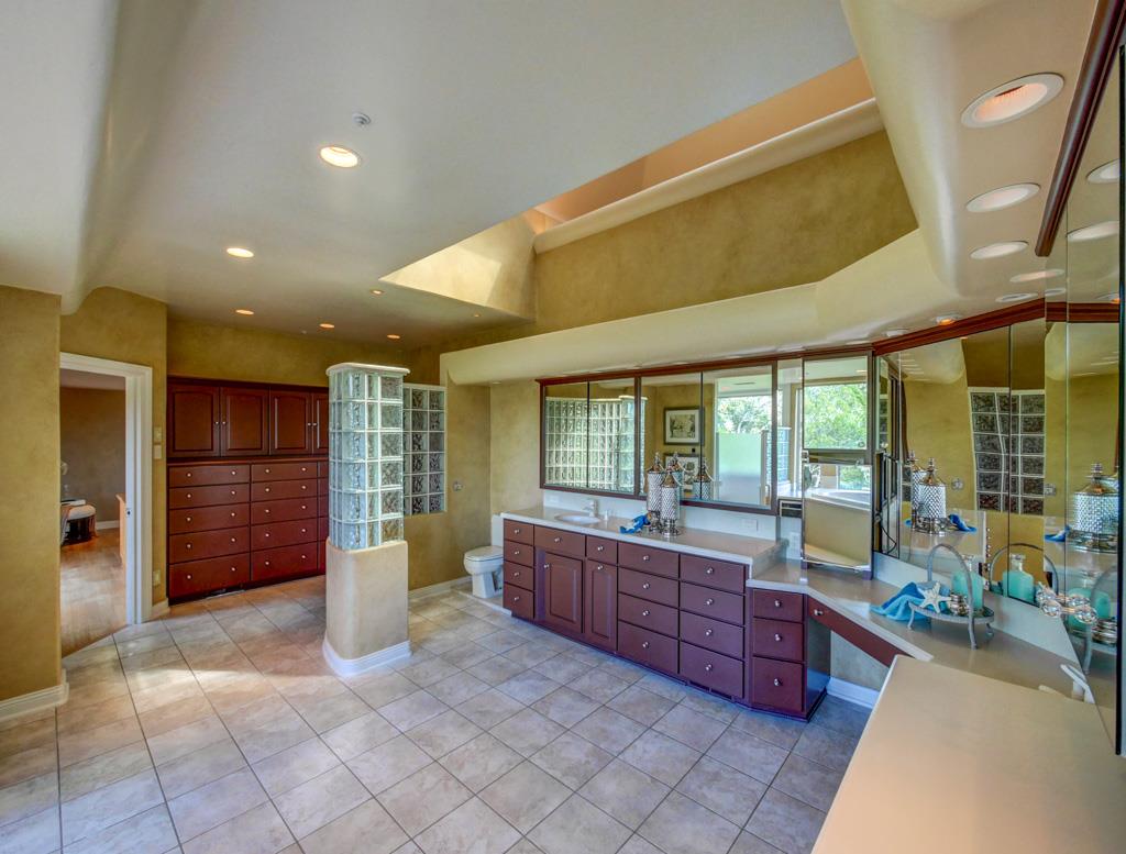 631 Quail Run Road Aptos, CA 95003 - Photo 20 of 39 a large bathroom with a large tub and sink