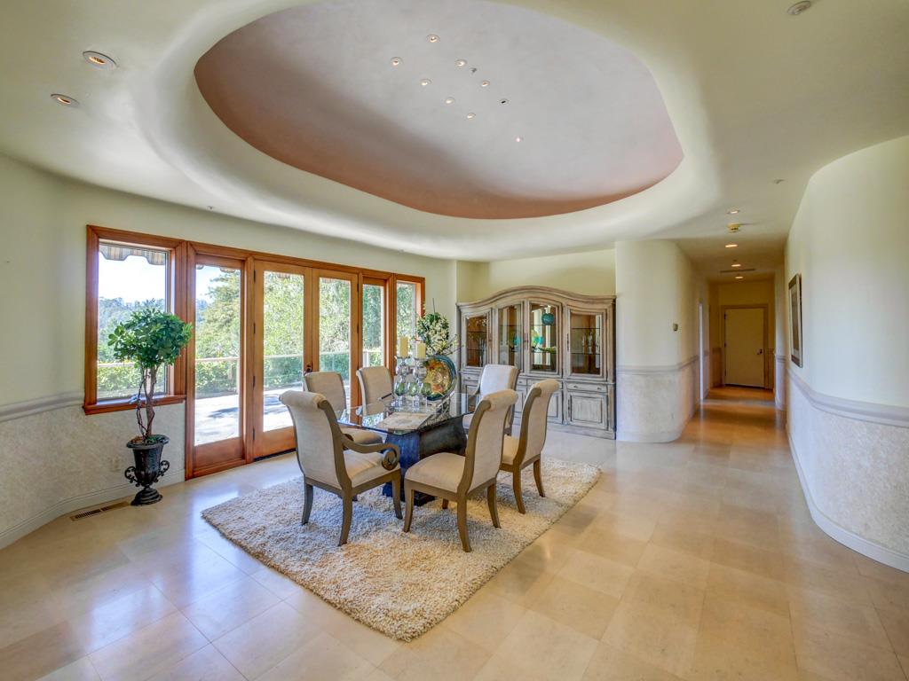 631 Quail Run Road Aptos, CA 95003 - Photo 22 of 39 a dining room with furniture and wooden floor