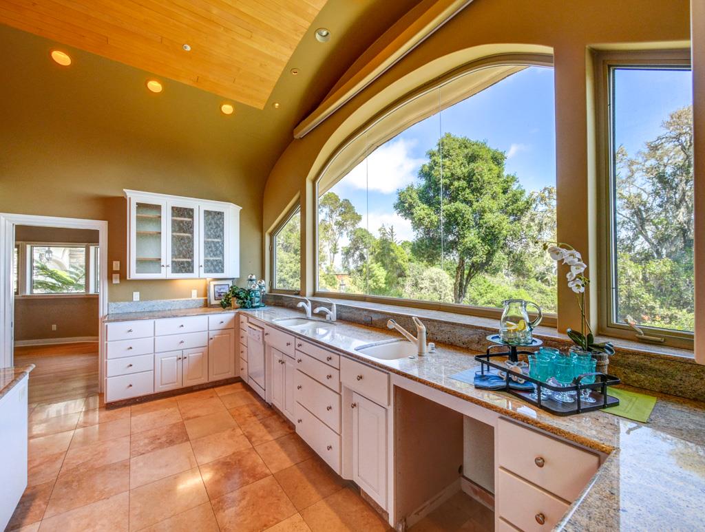 631 Quail Run Road Aptos, CA 95003 - Photo 24 of 39 a large kitchen with kitchen island a large window in it