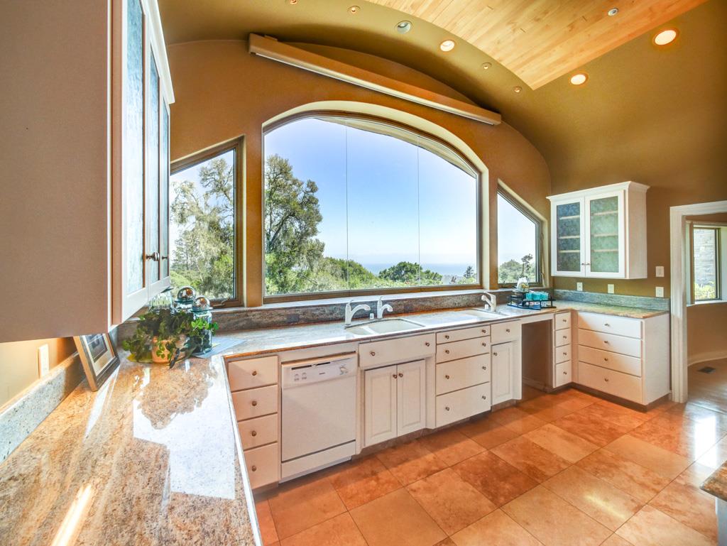 631 Quail Run Road Aptos, CA 95003 - Photo 30 of 39 a large white kitchen with a large window