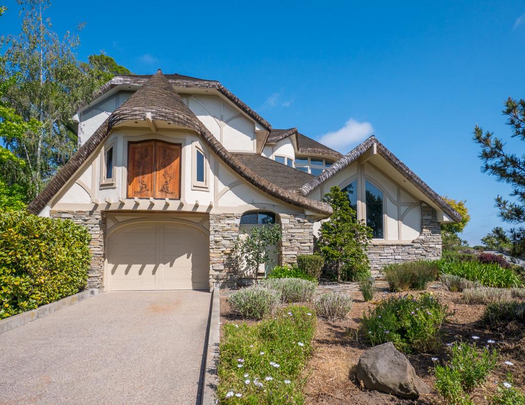 631 Quail Run Road Aptos, CA 95003 - Photo 33 of 39 a front view of a house with a yard