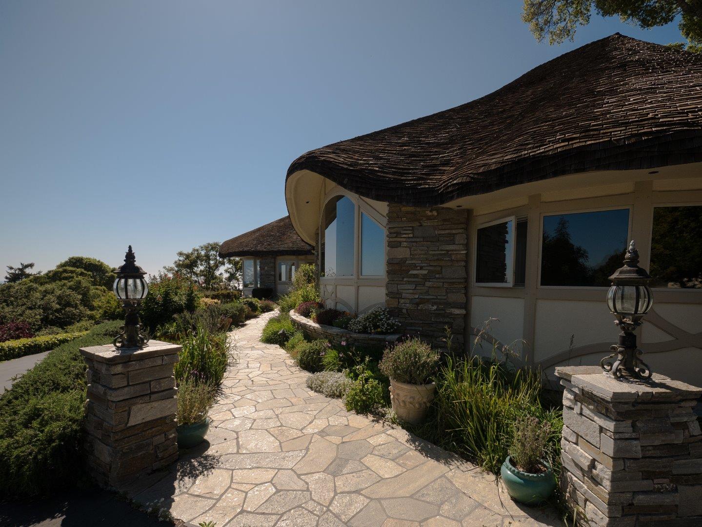 631 Quail Run Road Aptos, CA 95003 - Photo 37 of 39 a front view of a house with a yard