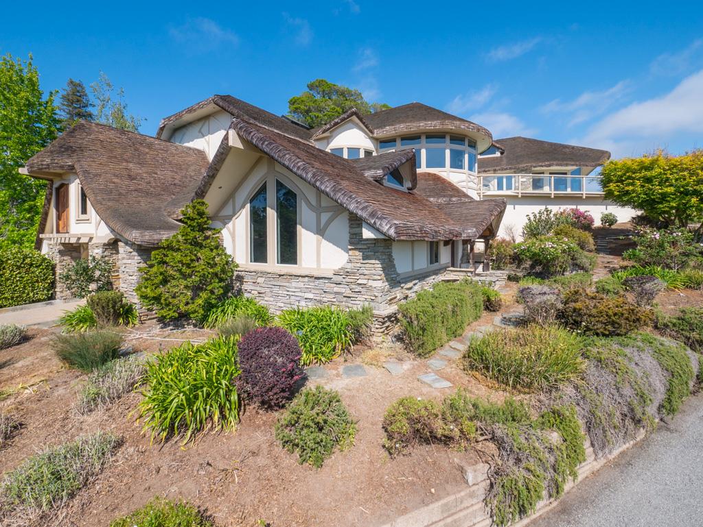 631 Quail Run Road Aptos, CA 95003 - Photo 5 of 39 a front view of a house with a yard