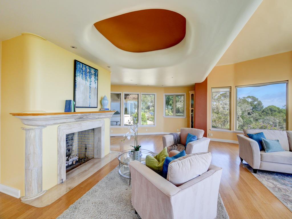 631 Quail Run Road Aptos, CA 95003 - Photo 7 of 39 a living room with furniture and a fireplace