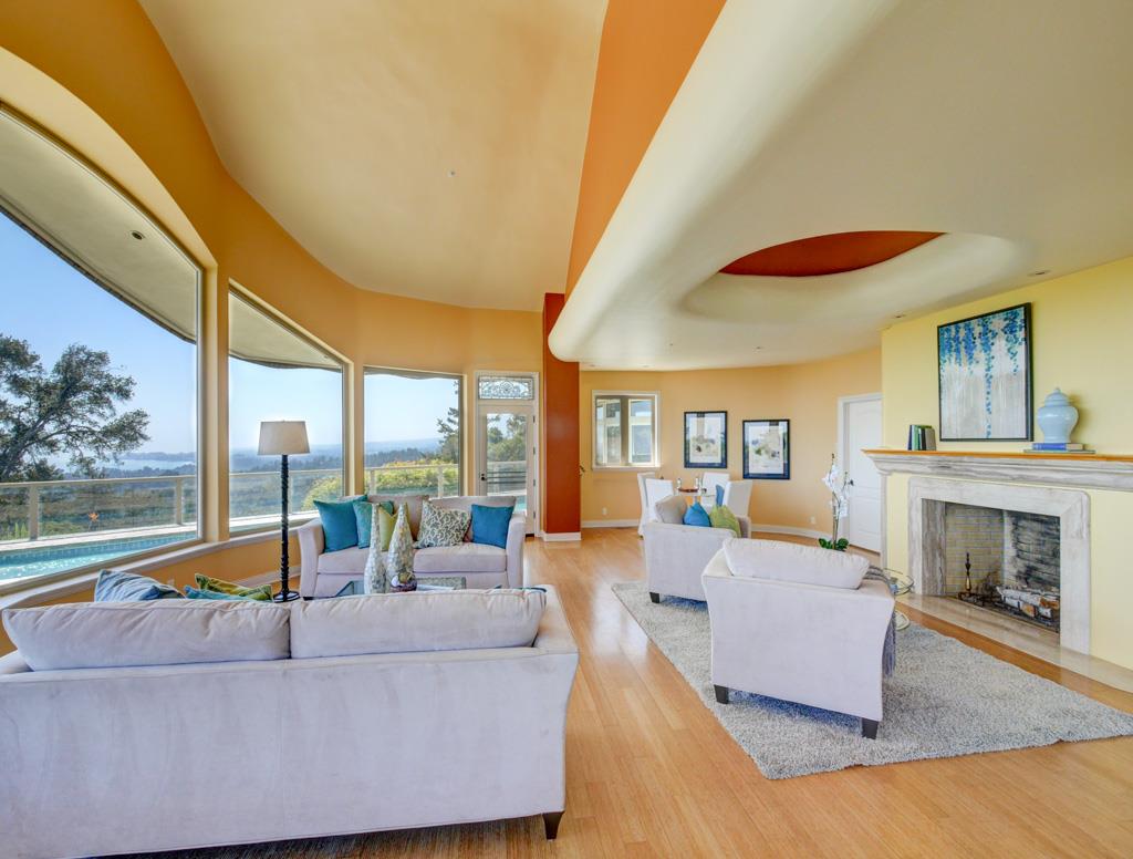631 Quail Run Road Aptos, CA 95003 - Photo 8 of 39 a living room with furniture and a fireplace