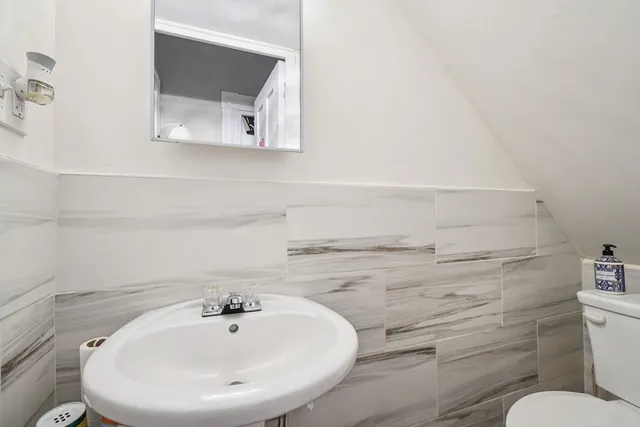 a bathroom with a sink and a toilet