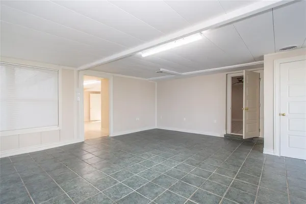 an empty room with windows