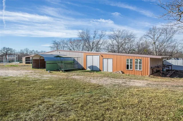 a view of a garden with an outdoor space