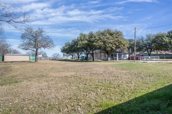 a house with trees in front of it