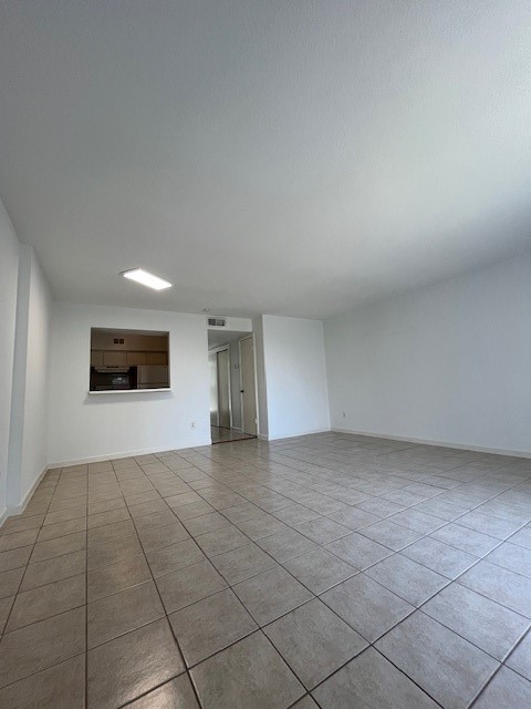 6201 Ranchester Drive, Unit 11 Houston, TX 77036 - Photo 3 of 12 a view of an empty room and window