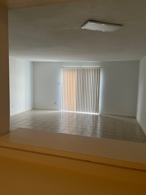 6201 Ranchester Drive, Unit 11 Houston, TX 77036 - Photo 5 of 12 an empty room with wooden floor