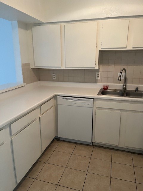 6201 Ranchester Drive, Unit 11 Houston, TX 77036 - Photo 6 of 12 a kitchen with a sink and cabinets