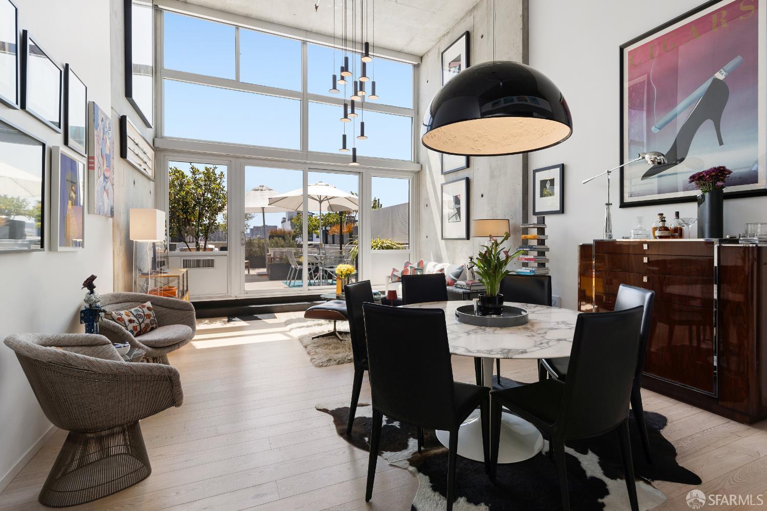 855 Folsom Street, Unit 519 San Francisco, CA 94107 - Photo 1 of 25 a view of a dining room with furniture and chandelier