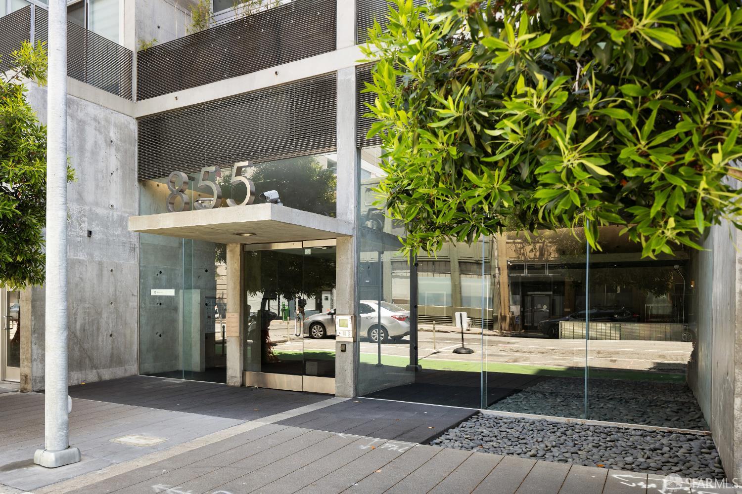 855 Folsom Street, Unit 519 San Francisco, CA 94107 - Photo 21 of 25 a view of a patio with table and chairs a barbeque