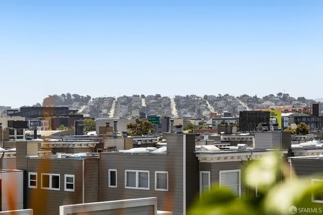 a view of a city with tall buildings