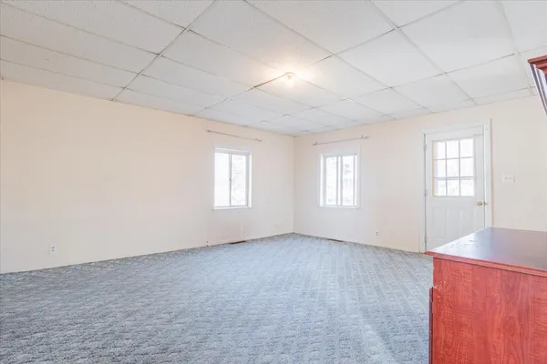 an empty room with windows