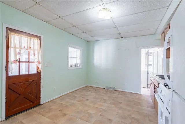 a view of a room with an entryway