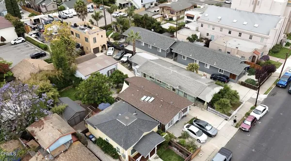 an aerial view of a city with lots of residential buildings