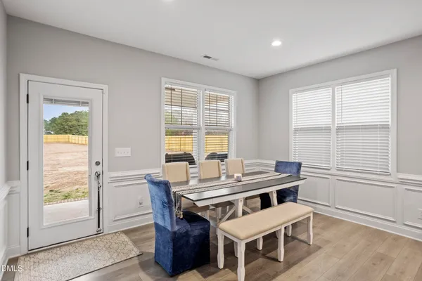 a bathroom with a shower and a sink