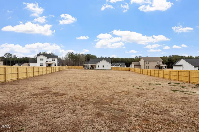 a view of a kitchen with a stove and cabinets