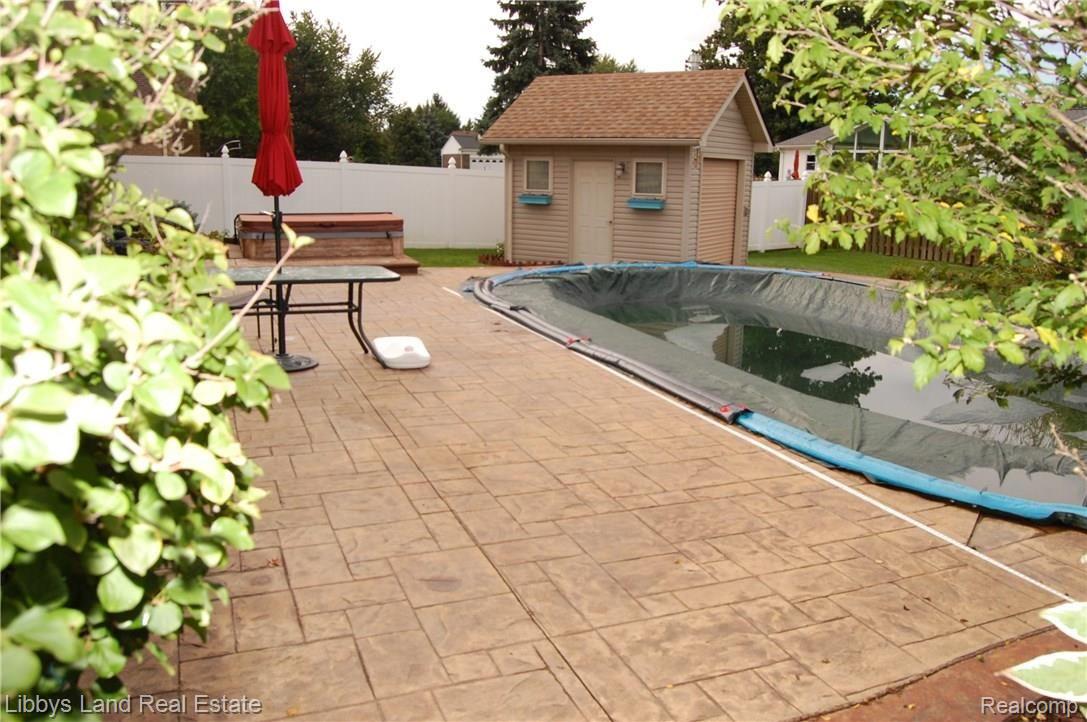 21382 Hall Road Trenton, MI 48183 - Photo 39 of 55 Pool Patio 3.JPG